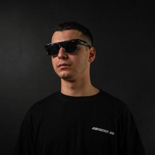 M.