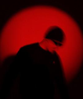 J.