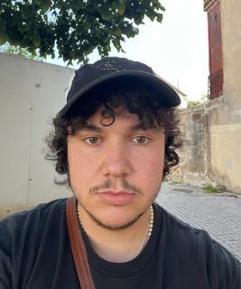 L.