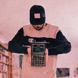 T.