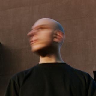 L.