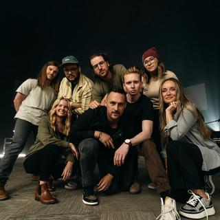 J.
