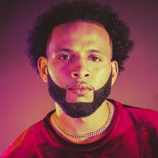 J.