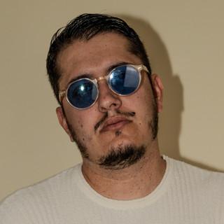 M.