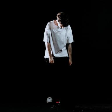 L.