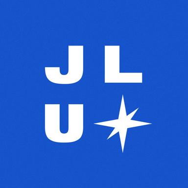 J.