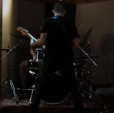 L.
