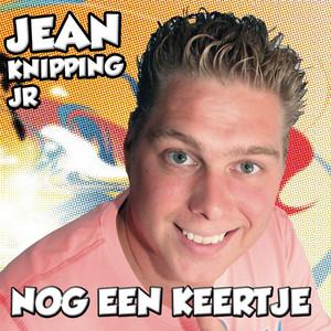 J.