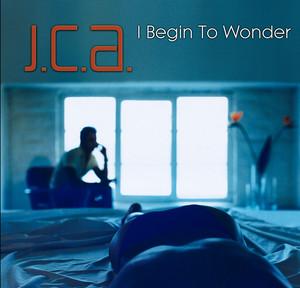 J.