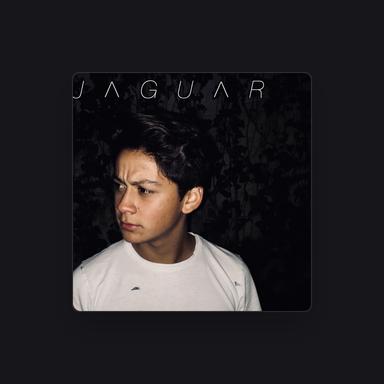 J.
